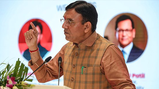 A guest of honour addressing the audience at a university event